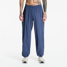 Tričko Under Armour Unstoppable Woven Pants Solid Downpour Gray S