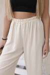 Široké nohavice béžovej farby UNI