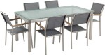 Beliani GROSSETO Sada záhradného nábytku stôl s bielou sklenenou doskou 180 x 90 cm 6 sivých stoličiek