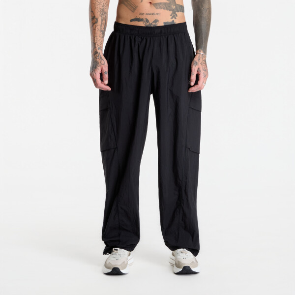 Tričko Under Armour Unstoppable Woven Pants Solid Ultimate Black S