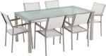Beliani GROSSETO Sada záhradného nábytku stôl s bielou sklenenou doskou 180 x 90 cm 6 bielych stoličiek