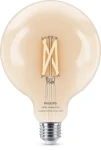 WiZ Filament G125 číra / Múdra LED žiarovka / E27 / 2700-6500K / 7 W / 806 lm / stmievateľná (SKL000481796)