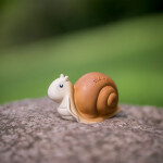 Tikiri Garden Friends - hrkálka a hryzátko z prírodnej gumy - Slimák
