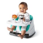 BABY EINSTEIN Podsedák na stoličku s 2 hračkami 2v1 Dine & Discover 6m+ do 23 kg